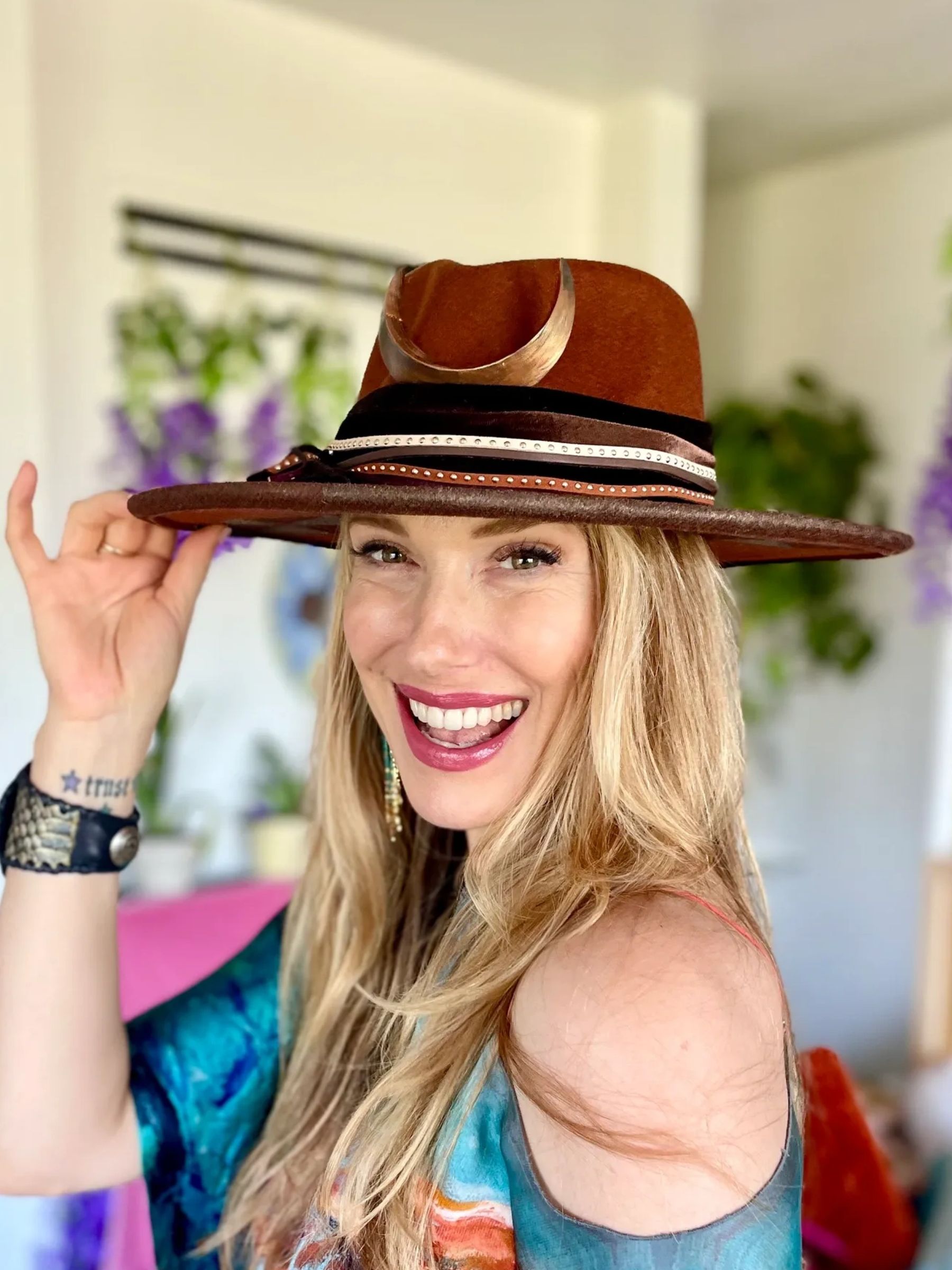 A rad human in her custom Rad Hat